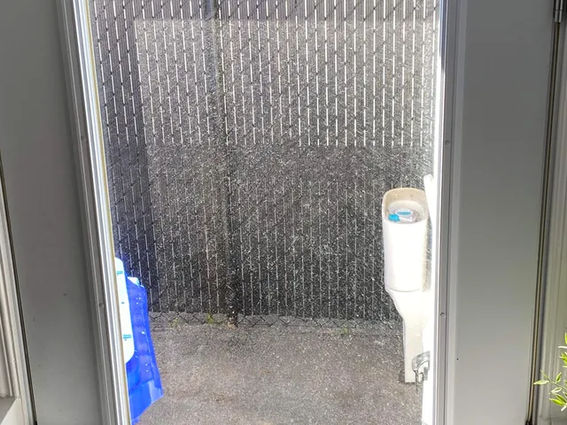 Lavage de vitres — porte extérieure — avant